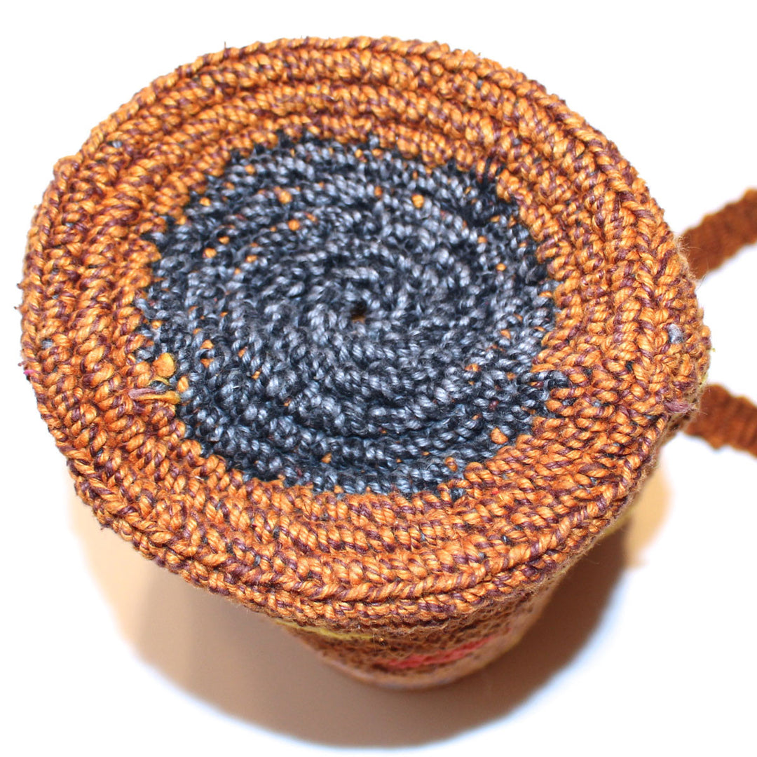 round bottom closeup of Mayan hand woven bag brown and black colors