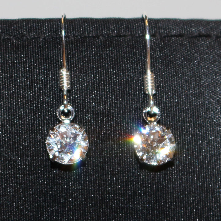 beautiful crystal drop earrings shining with rainbow coming from crystal